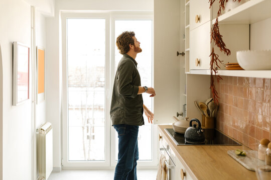 Mature adult man in the kitchen