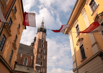 Famous Saint Mary's Basilica (Mariacki Church Kraków) at the Main Market Square in the Old Town...