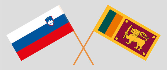 Crossed flags of Slovenia and Sri Lanka. Official colors. Correct proportion