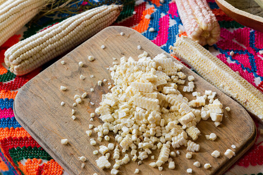 Chopped white corn on a wooden table