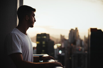 Man looking at the view of skyscrapers