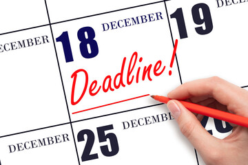 Hand drawing red line and writing the text Deadline on calendar date December 18. Deadline word written on calendar