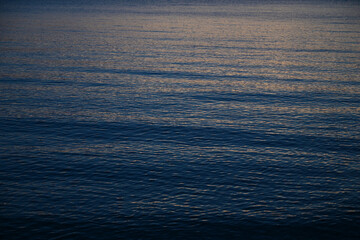 dark blue sea background, moody sky