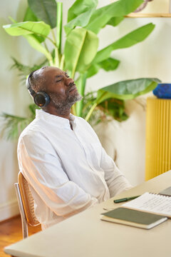meditating to music at home office