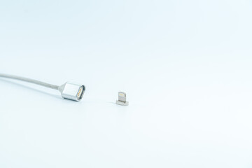Magnetic charging cable (cord) isolated on white background