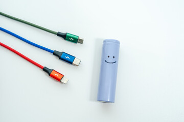 Сharging cables and battery 18650 with smile isolated