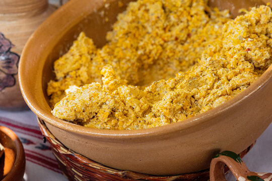 grains of yellow corn ground into a dough