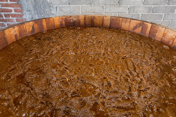 Maguey fiber fermenting in wooden vats