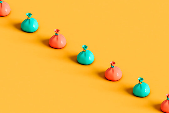 trash bags in a row on orange background. 3d render
