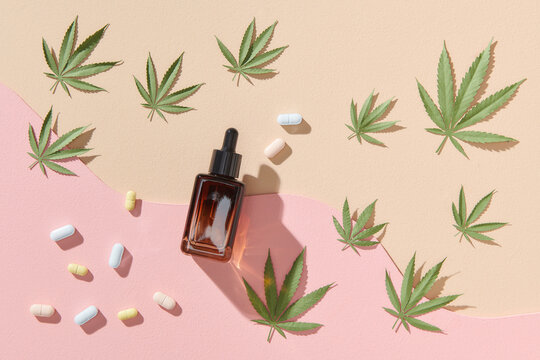 Various glass bottles with CBD oil, THC tincture, capsules