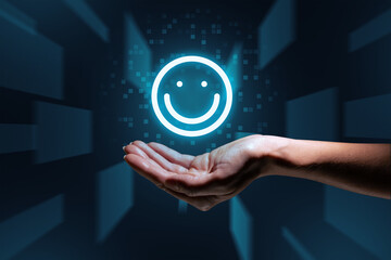 Good mood concept. Emoticon hologram over hand.