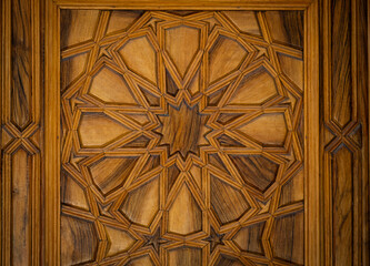 Oriental pattern, geometric islamic art decoration on wooden door