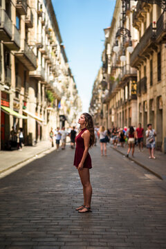 Beautiful Woman Exploring City Streets