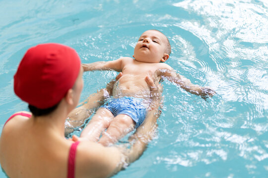 baby enjoying the pool