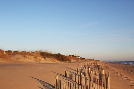A Quiet Beach At Sunrise - Powered by Adobe