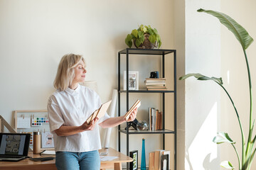 Female entrepreneur working at her design studio