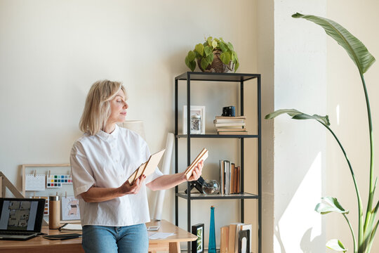 Female entrepreneur working at her design studio