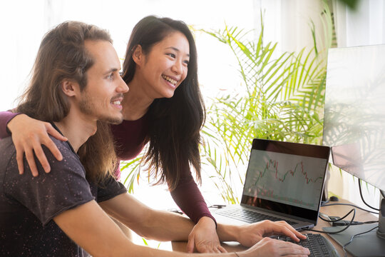 Couple Investing In Stock Concept