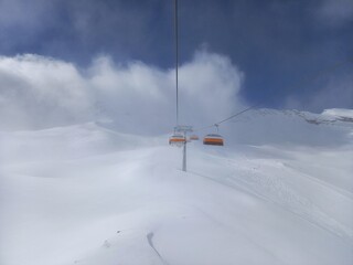 Fototapeta na wymiar Ski Lift with clouds 
