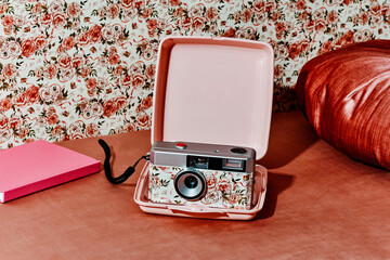 floral-patterned camera in a pink case