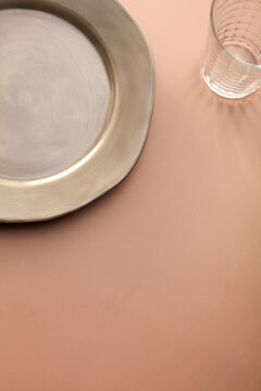 Closeup blank plate and glass cup