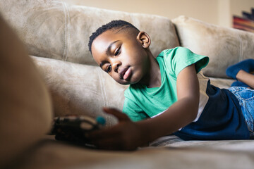 Kid playing with a game console
