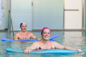 Senior woman at aqua gym session