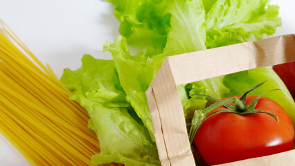 Food delivery - fresh vegetables, fruit, pasta in a paper bag, zero waste concept, online shopping,...