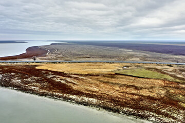 steppe plain landscape lake in the middle of fields