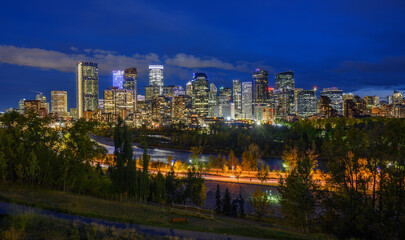 Fototapeta na wymiar Skyline of Calgary with Bow River in Canada at night