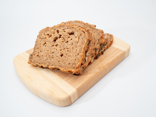 bread with pumpkin seeds on a white background.