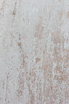 Close up photo of old white exfoliate paint plank wooden texture detail background. Grunge style for decoration