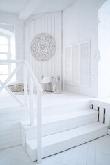 White wooden stairs of the railing of the step
