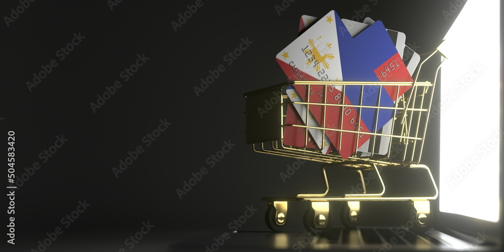 Poster credit card mockups with flags of philippines in a small shopping cart on the laptop. 3d rendering