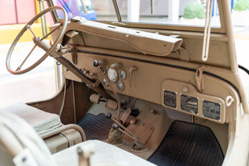 Military vehicle, American SUV, sand color. Inside view, army minimalist design