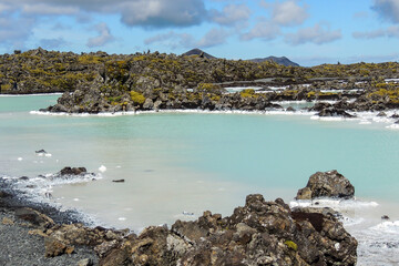 Blue thermal water lagoon in geothermal area in Iceland