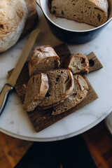 sliced pieces of sourdough bread close-up. cut freshly baked bread. bread with holes in the crumb