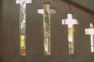 Wooden door with a cross.