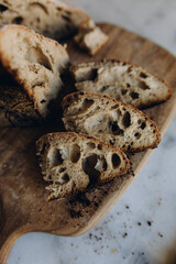 sliced pieces of sourdough bread close-up. the pulp of bread with holes. craft sourdough bread macro photo.