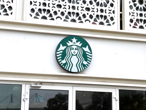 Antalya, Turkey - May 13, 2021: Starbucks logo on the entrance door of the Starbucks coffee shop
