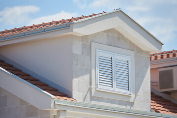 Window with closed shutters in modern house