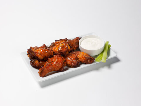 Chicken wings with celery and ranch dressing