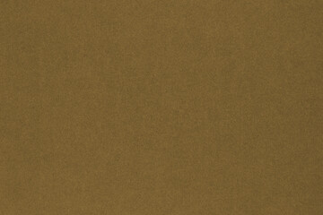 Brown colored paper texture. Textured surface with cellulose fibers. Cigar coloured background or wallpaper