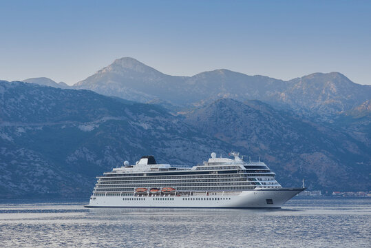 Cruise liner ship in sea on mountains landscape, bay of Kotor