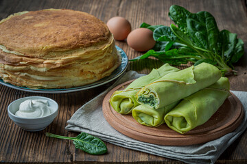 Pancakes with Spinach, Sour cream, Served Table
