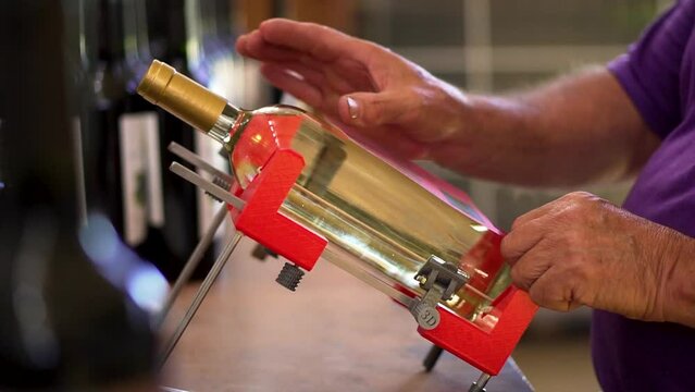 hand labeling of wine bottles