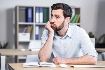 Close-up portrait of pensive man in office, businessman thinking over decision - obrazy, fototapety, plakaty