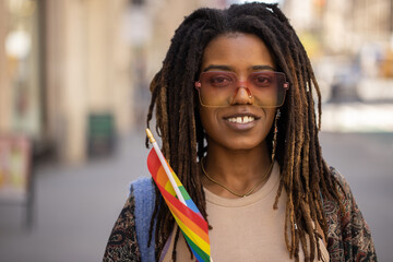 LGBTQ young black woman in city portrait smile happy - obrazy, fototapety, plakaty