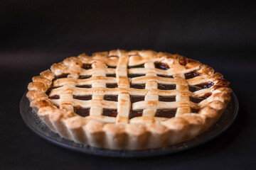 Homemade pie with black background