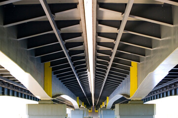 Framework under bridge. Grey metal and concrete modern design.